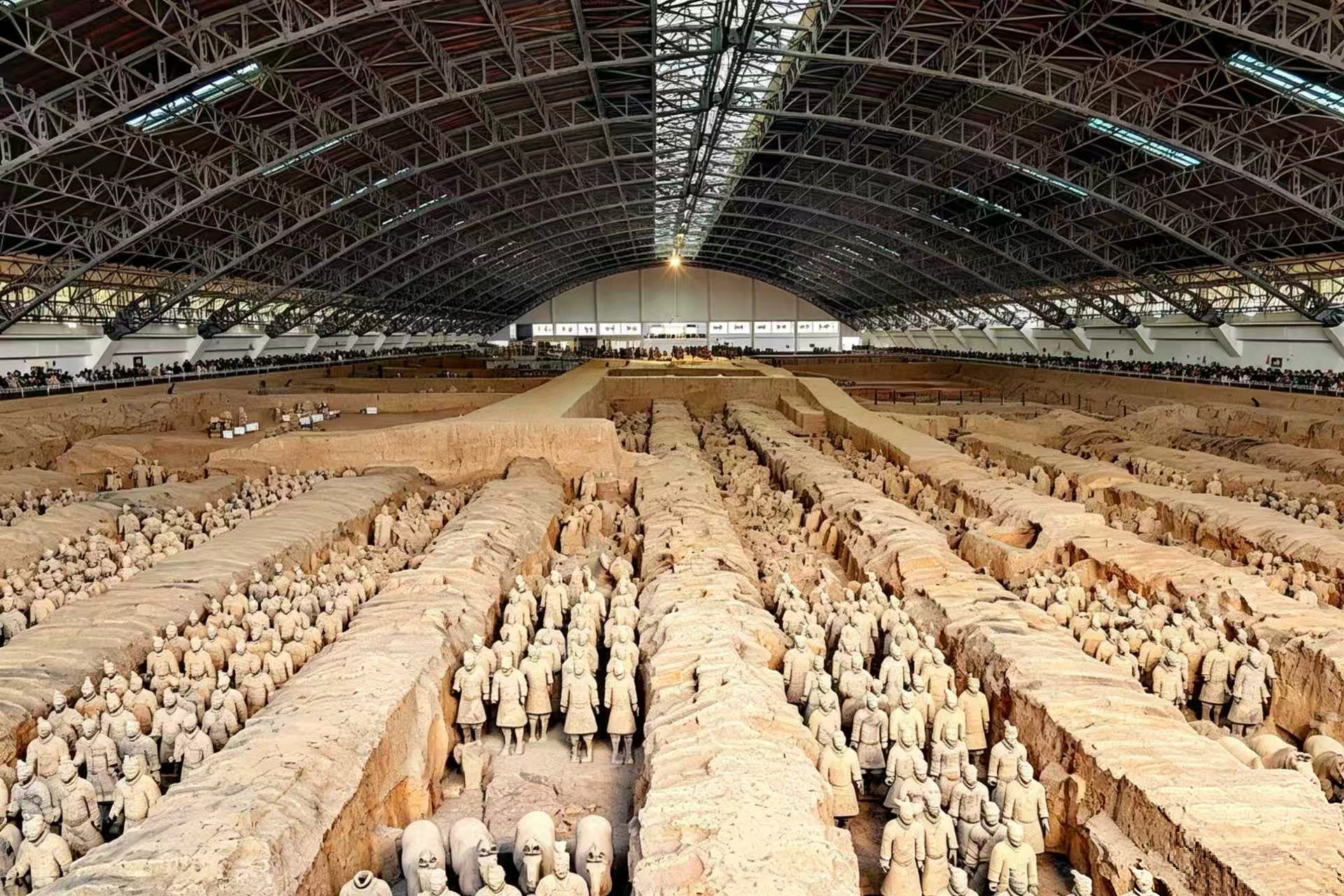 Row after row of life-sized Terracotta Warriors in battle formation — Pit 1 at the Qin Shi Huang Mausoleum Museum